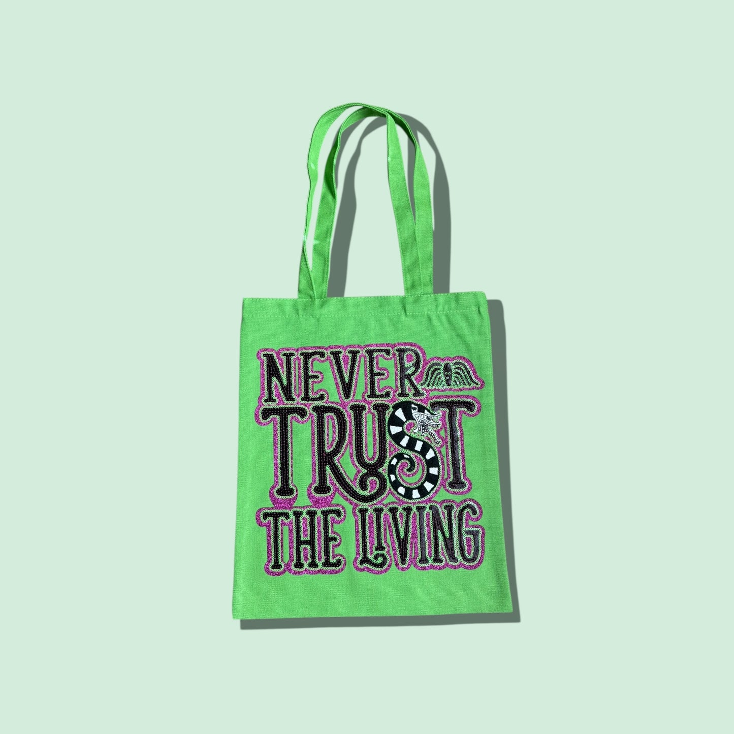 Never Trust the Living Beetle Juice Tote
